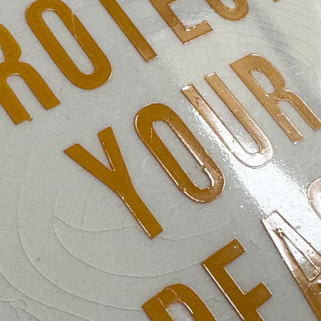 Gold text 'PROTECT YOUR PE' on a white background