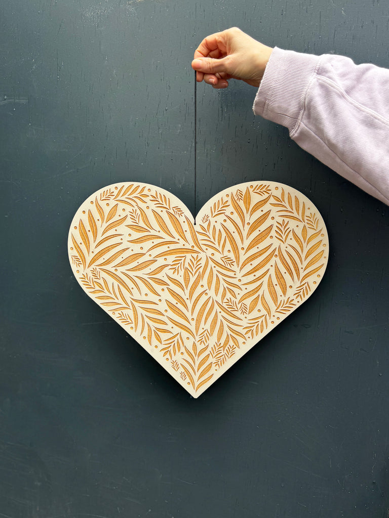 romantic wooden engraved heart, in off white made by modo