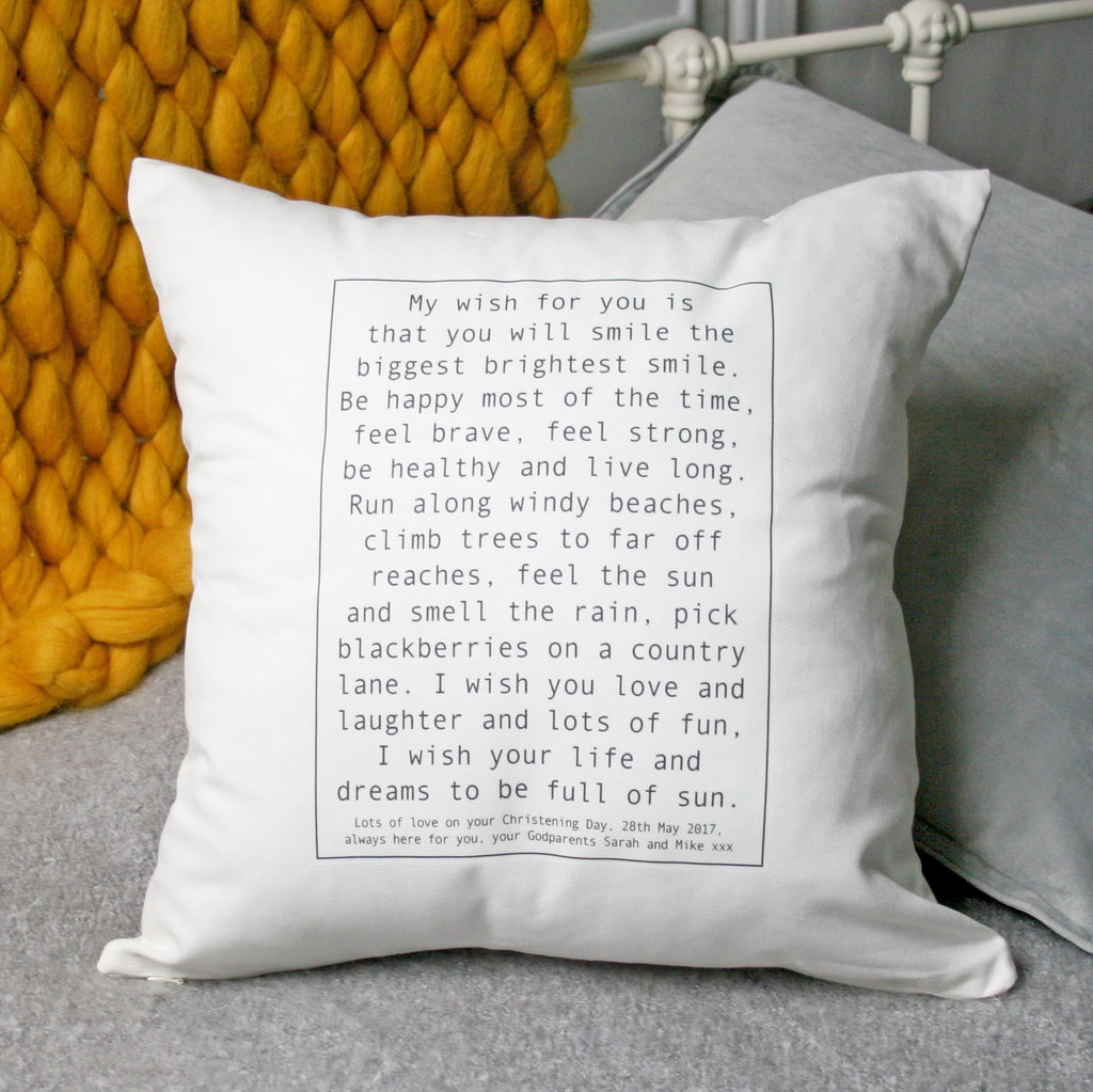 square white pillow showing a persons desired wish to their baby. in large thin lined box