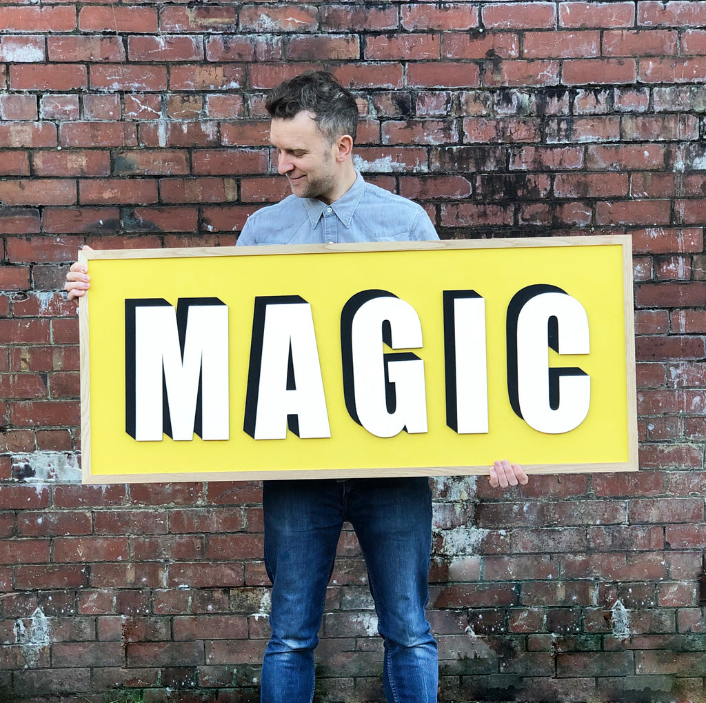 Magic bold personalised framed wooden word sign with drop shadow. Striking yellow background painted in Lamp Lighter by Craig and Rose.